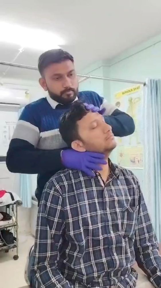 Physiotherapy treatment in progress at Spine-X Chiropractic clinic